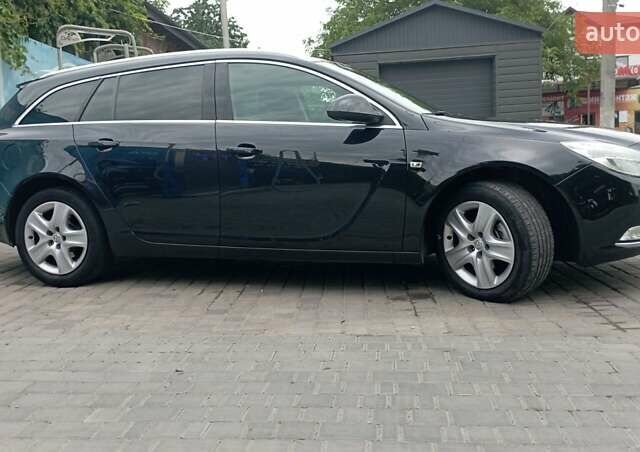 Чорний Опель Інсігнія, об'ємом двигуна 1.96 л та пробігом 234 тис. км за 8800 $, фото 13 на Automoto.ua
