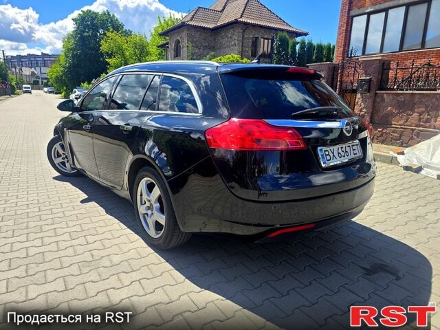 Чорний Опель Інсігнія, об'ємом двигуна 2 л та пробігом 270 тис. км за 8500 $, фото 6 на Automoto.ua