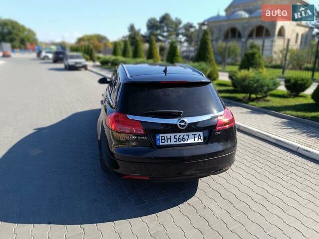 Чорний Опель Інсігнія, об'ємом двигуна 1.96 л та пробігом 295 тис. км за 7800 $, фото 4 на Automoto.ua