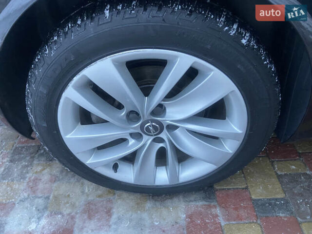 Чорний Опель Інсігнія, об'ємом двигуна 2 л та пробігом 182 тис. км за 9700 $, фото 24 на Automoto.ua