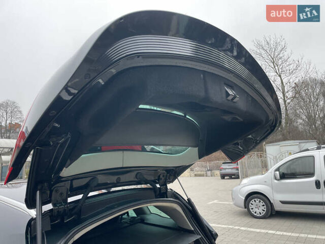 Черный Опель Инсигния, объемом двигателя 2 л и пробегом 180 тыс. км за 9400 $, фото 94 на Automoto.ua