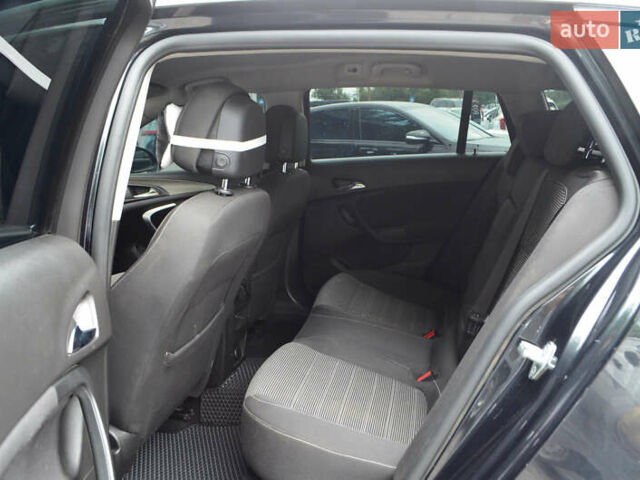 Черный Опель Инсигния, объемом двигателя 1.96 л и пробегом 213 тыс. км за 8999 $, фото 15 на Automoto.ua