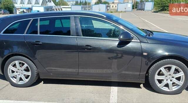 Черный Опель Инсигния, объемом двигателя 1.96 л и пробегом 248 тыс. км за 8150 $, фото 1 на Automoto.ua