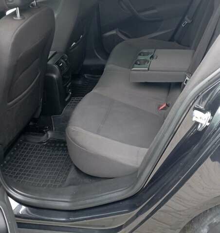 Чорний Опель Інсігнія, об'ємом двигуна 1.96 л та пробігом 234 тис. км за 8800 $, фото 21 на Automoto.ua