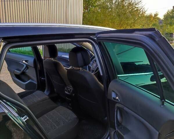 Черный Опель Инсигния, объемом двигателя 2 л и пробегом 272 тыс. км за 10260 $, фото 21 на Automoto.ua