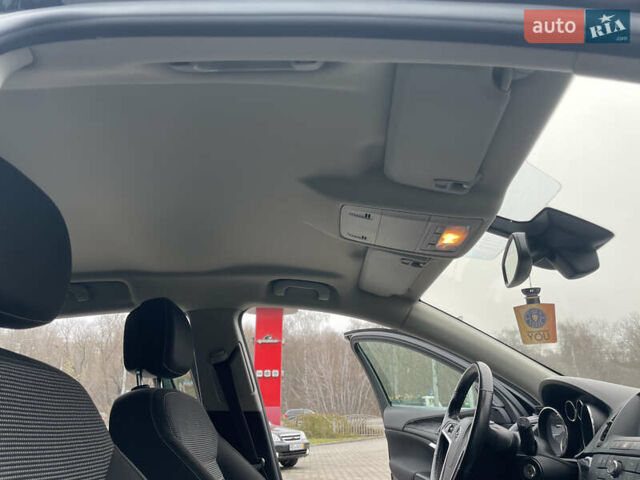 Черный Опель Инсигния, объемом двигателя 2 л и пробегом 180 тыс. км за 9400 $, фото 72 на Automoto.ua