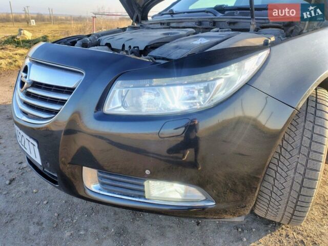 Чорний Опель Інсігнія, об'ємом двигуна 1.96 л та пробігом 345 тис. км за 8500 $, фото 36 на Automoto.ua