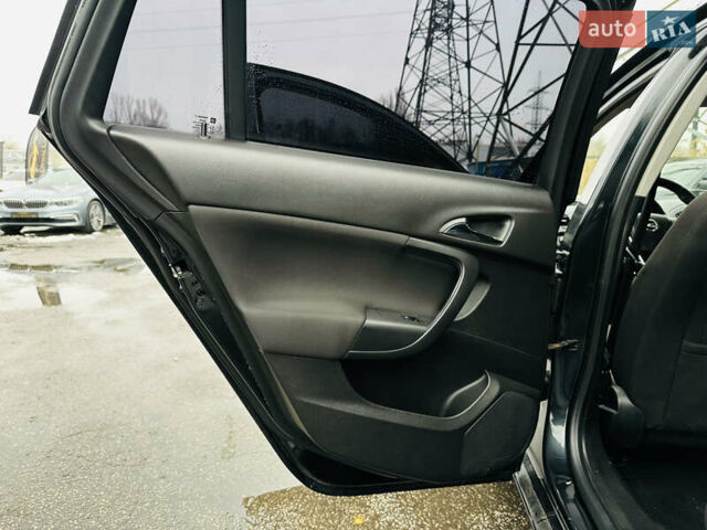 Чорний Опель Інсігнія, об'ємом двигуна 1.96 л та пробігом 264 тис. км за 9800 $, фото 17 на Automoto.ua