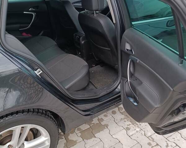 Чорний Опель Інсігнія, об'ємом двигуна 1.96 л та пробігом 300 тис. км за 7700 $, фото 12 на Automoto.ua