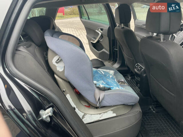 Черный Опель Инсигния, объемом двигателя 2 л и пробегом 180 тыс. км за 9400 $, фото 78 на Automoto.ua