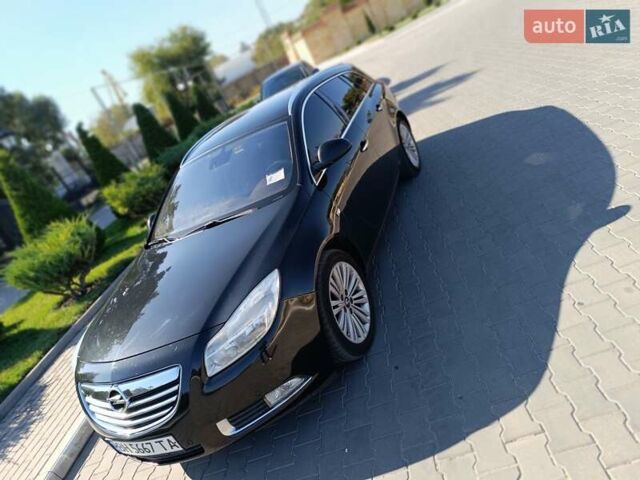 Чорний Опель Інсігнія, об'ємом двигуна 1.96 л та пробігом 295 тис. км за 7800 $, фото 1 на Automoto.ua