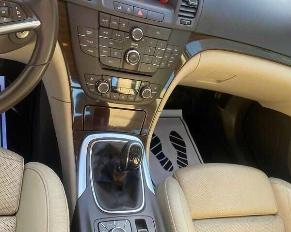 Черный Опель Инсигния, объемом двигателя 2 л и пробегом 275 тыс. км за 9100 $, фото 3 на Automoto.ua