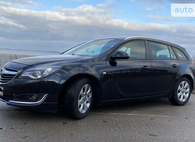 Чорний Опель Інсігнія, об'ємом двигуна 2 л та пробігом 258 тис. км за 8500 $, фото 1 на Automoto.ua