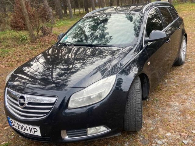 Чорний Опель Інсігнія, об'ємом двигуна 2 л та пробігом 270 тис. км за 8500 $, фото 2 на Automoto.ua