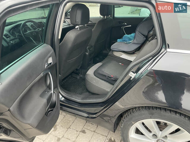 Черный Опель Инсигния, объемом двигателя 2 л и пробегом 180 тыс. км за 9400 $, фото 100 на Automoto.ua