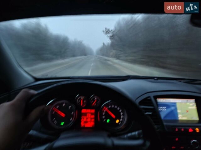 Чорний Опель Інсігнія, об'ємом двигуна 1.96 л та пробігом 345 тис. км за 8500 $, фото 51 на Automoto.ua