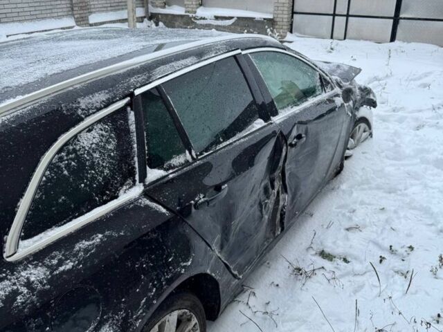 Черный Опель Инсигния, объемом двигателя 2 л и пробегом 270 тыс. км за 3498 $, фото 6 на Automoto.ua