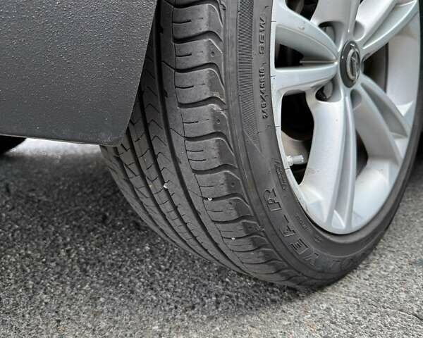 Чорний Опель Інсігнія, об'ємом двигуна 1.96 л та пробігом 237 тис. км за 12000 $, фото 5 на Automoto.ua