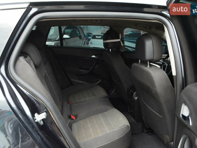 Черный Опель Инсигния, объемом двигателя 1.96 л и пробегом 213 тыс. км за 8999 $, фото 16 на Automoto.ua