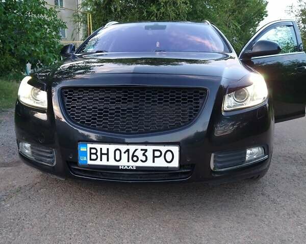 Чорний Опель Інсігнія, об'ємом двигуна 2 л та пробігом 198 тис. км за 12100 $, фото 27 на Automoto.ua