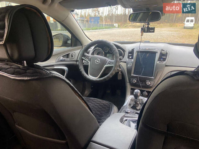Черный Опель Инсигния, объемом двигателя 2 л и пробегом 270 тыс. км за 8800 $, фото 11 на Automoto.ua