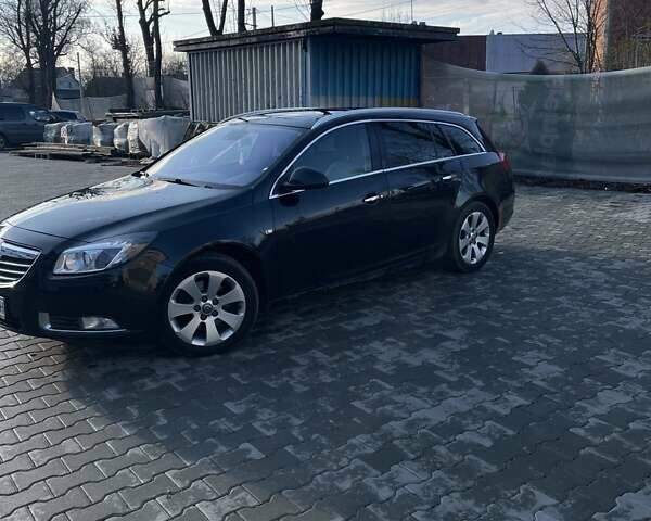 Черный Опель Инсигния, объемом двигателя 1.96 л и пробегом 340 тыс. км за 7500 $, фото 1 на Automoto.ua