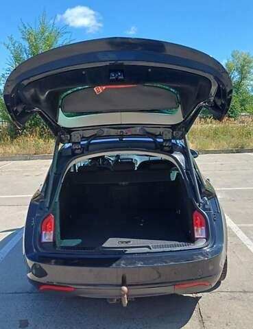 Черный Опель Инсигния, объемом двигателя 1.96 л и пробегом 248 тыс. км за 8150 $, фото 4 на Automoto.ua