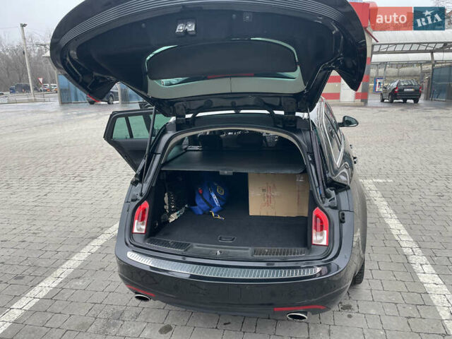 Черный Опель Инсигния, объемом двигателя 2 л и пробегом 180 тыс. км за 9400 $, фото 81 на Automoto.ua