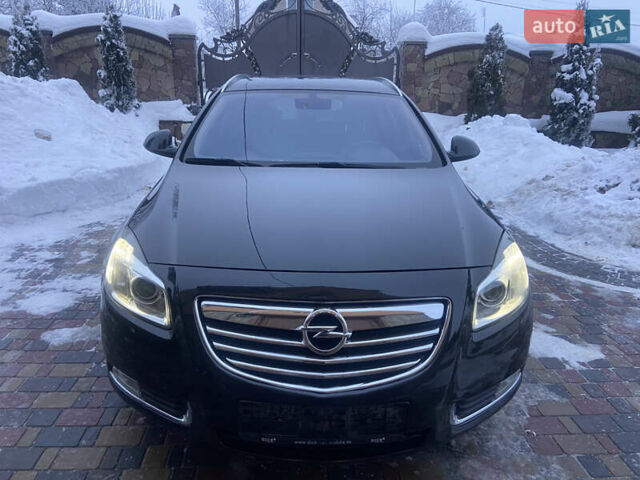 Чорний Опель Інсігнія, об'ємом двигуна 2 л та пробігом 182 тис. км за 9700 $, фото 2 на Automoto.ua