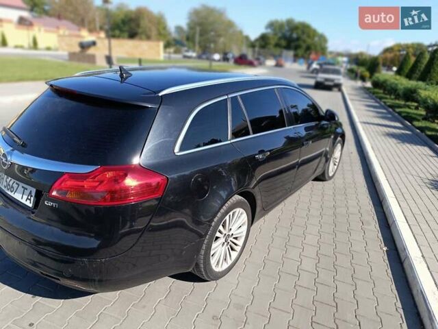 Чорний Опель Інсігнія, об'ємом двигуна 1.96 л та пробігом 295 тис. км за 7800 $, фото 5 на Automoto.ua