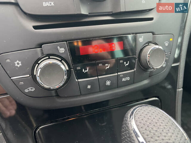 Черный Опель Инсигния, объемом двигателя 2 л и пробегом 180 тыс. км за 9400 $, фото 125 на Automoto.ua