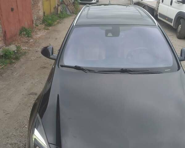 Чорний Опель Інсігнія, об'ємом двигуна 2 л та пробігом 196 тис. км за 13000 $, фото 14 на Automoto.ua