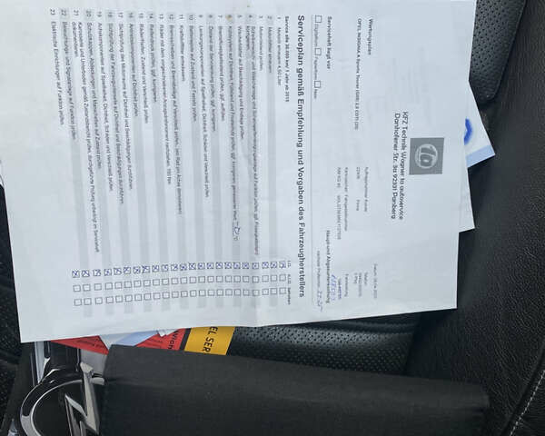 Чорний Опель Інсігнія, об'ємом двигуна 1.96 л та пробігом 170 тис. км за 11900 $, фото 15 на Automoto.ua