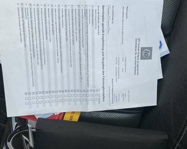 Чорний Опель Інсігнія, об'ємом двигуна 1.96 л та пробігом 172 тис. км за 10400 $, фото 20 на Automoto.ua