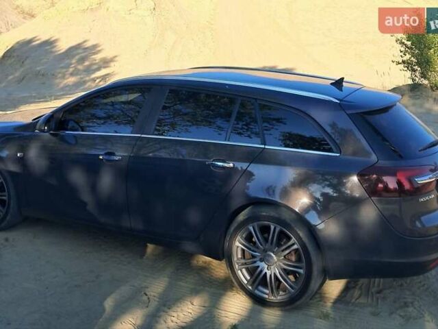 Чорний Опель Інсігнія, об'ємом двигуна 2 л та пробігом 272 тис. км за 9800 $, фото 6 на Automoto.ua