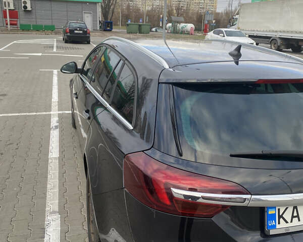 Чорний Опель Інсігнія, об'ємом двигуна 1.96 л та пробігом 242 тис. км за 10600 $, фото 3 на Automoto.ua