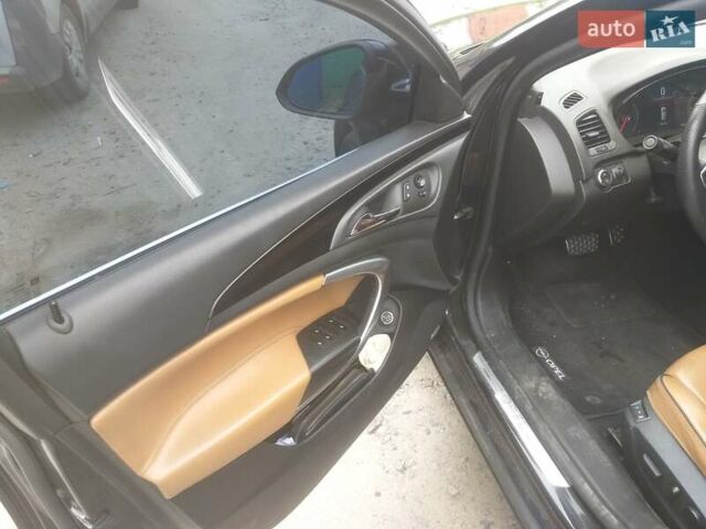 Чорний Опель Інсігнія, об'ємом двигуна 2 л та пробігом 196 тис. км за 13000 $, фото 1 на Automoto.ua