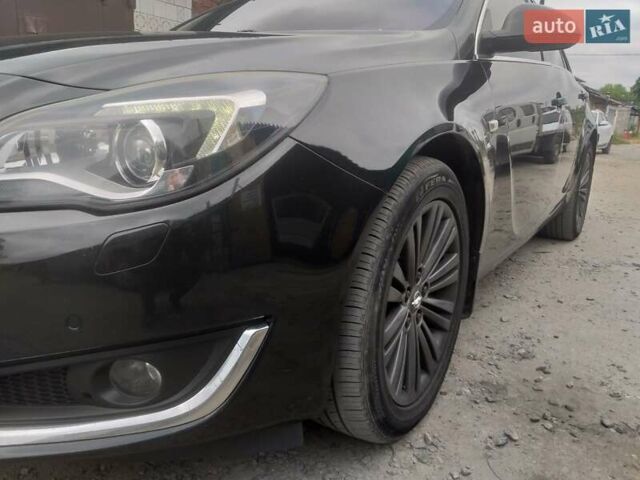 Чорний Опель Інсігнія, об'ємом двигуна 2 л та пробігом 196 тис. км за 13000 $, фото 16 на Automoto.ua