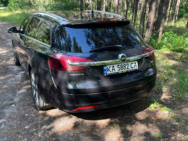 Чорний Опель Інсігнія, об'ємом двигуна 2 л та пробігом 285 тис. км за 13111 $, фото 3 на Automoto.ua