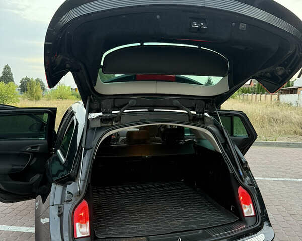 Черный Опель Инсигния, объемом двигателя 1.96 л и пробегом 230 тыс. км за 12000 $, фото 10 на Automoto.ua