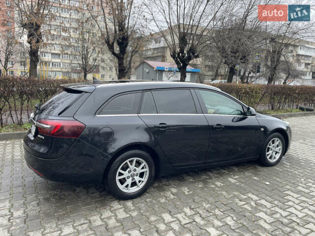 Чорний Опель Інсігнія, об'ємом двигуна 1.96 л та пробігом 250 тис. км за 8700 $, фото 5 на Automoto.ua