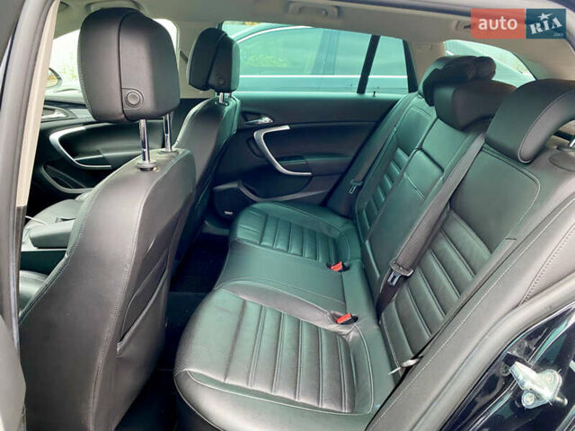 Чорний Опель Інсігнія, об'ємом двигуна 1.96 л та пробігом 170 тис. км за 11900 $, фото 11 на Automoto.ua