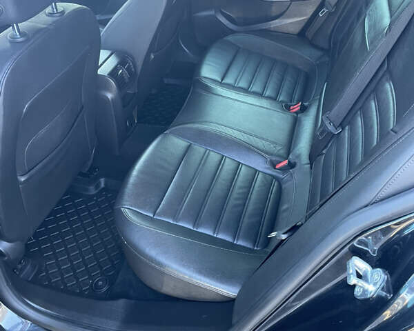 Чорний Опель Інсігнія, об'ємом двигуна 2 л та пробігом 233 тис. км за 12888 $, фото 32 на Automoto.ua