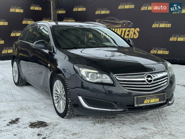 Чорний Опель Інсігнія, об'ємом двигуна 2 л та пробігом 243 тис. км за 10000 $, фото 5 на Automoto.ua