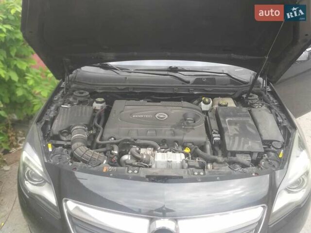 Чорний Опель Інсігнія, об'ємом двигуна 2 л та пробігом 196 тис. км за 13000 $, фото 59 на Automoto.ua