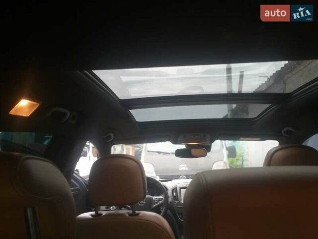 Чорний Опель Інсігнія, об'ємом двигуна 2 л та пробігом 196 тис. км за 13000 $, фото 56 на Automoto.ua