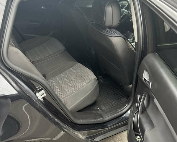 Черный Опель Инсигния, объемом двигателя 1.96 л и пробегом 285 тыс. км за 9800 $, фото 6 на Automoto.ua