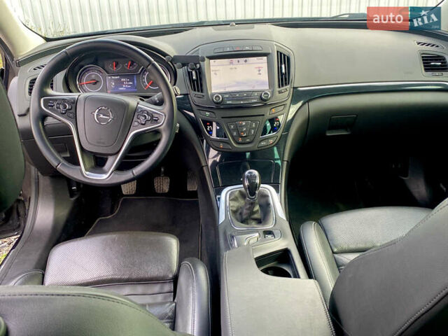 Чорний Опель Інсігнія, об'ємом двигуна 1.96 л та пробігом 170 тис. км за 11900 $, фото 8 на Automoto.ua