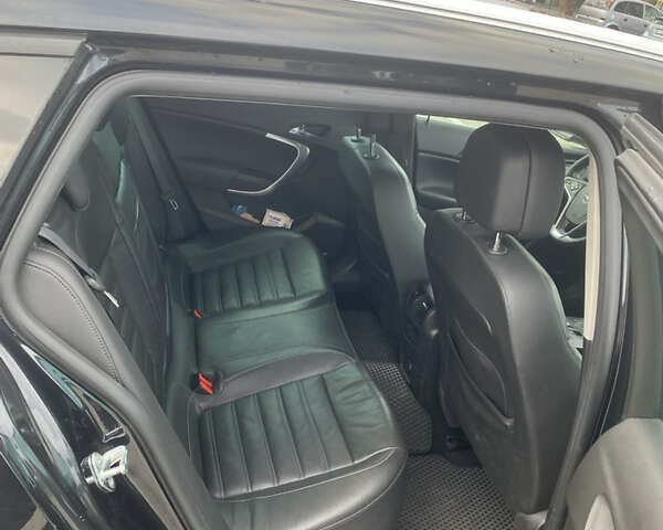 Чорний Опель Інсігнія, об'ємом двигуна 1.96 л та пробігом 242 тис. км за 10600 $, фото 7 на Automoto.ua