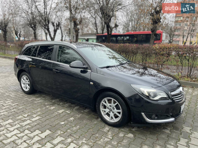 Чорний Опель Інсігнія, об'ємом двигуна 1.96 л та пробігом 250 тис. км за 8700 $, фото 4 на Automoto.ua